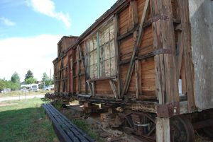 Old Rail Car sitting on wooden tracks