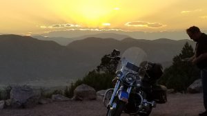Motorcycle ride at sunset in the Wet Mountain Valley