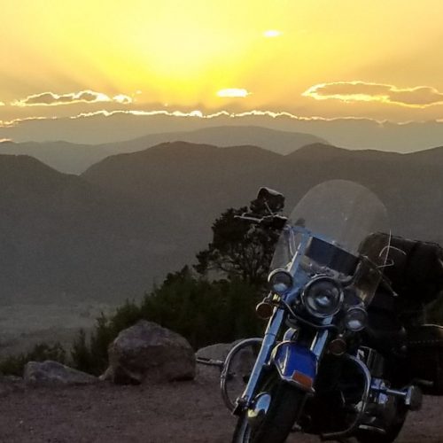 Motorcycle ride at sunset in the Wet Mountain Valley
