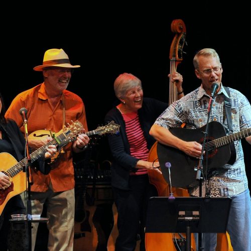 Quartet of Musicians on stage performing at High Mountain Hay Fever Music Festival